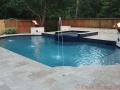 Geometric Pool and Spa with Deck Jets and Fire Bowls