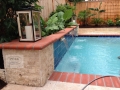 Geometric Pool with Raised Sheer Desent Wall