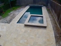 Geometric Pool with Raised Spa and Wall