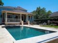 Geometric Glass Tile Pool with Raised Spa